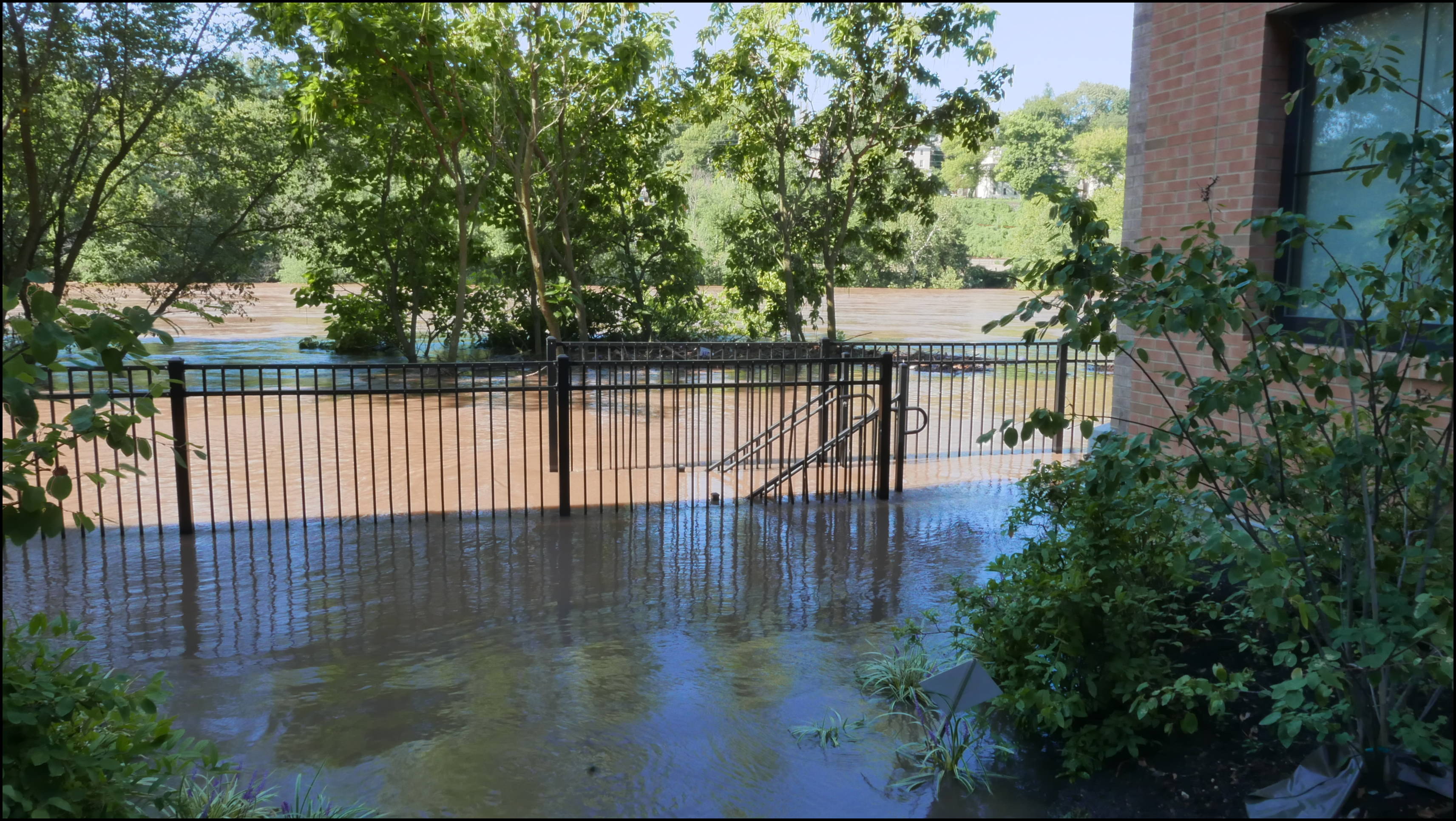 The Locks development -- River behind houses