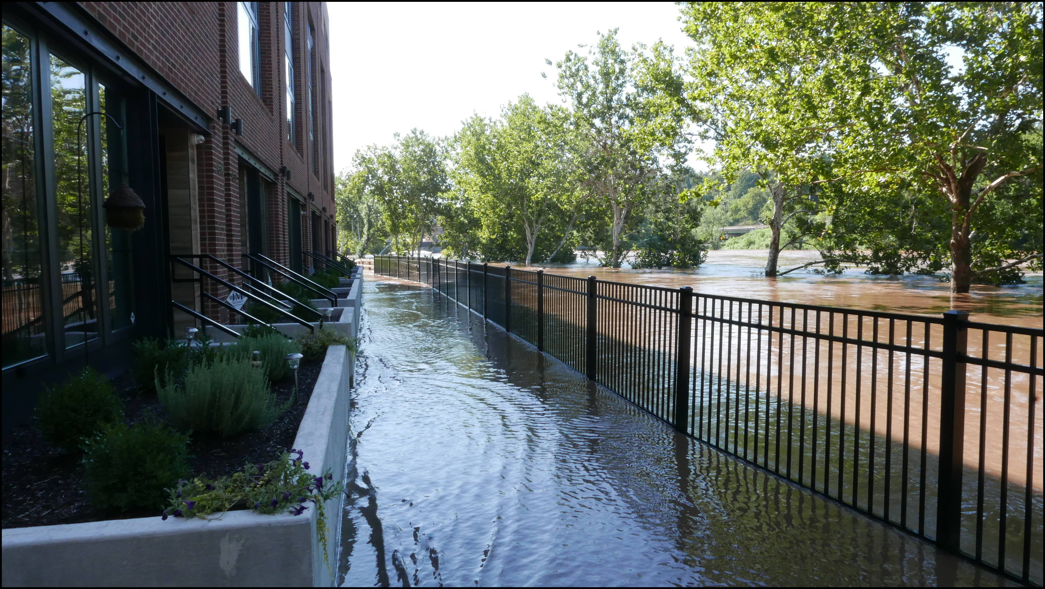 The Locks development -- River behind houses