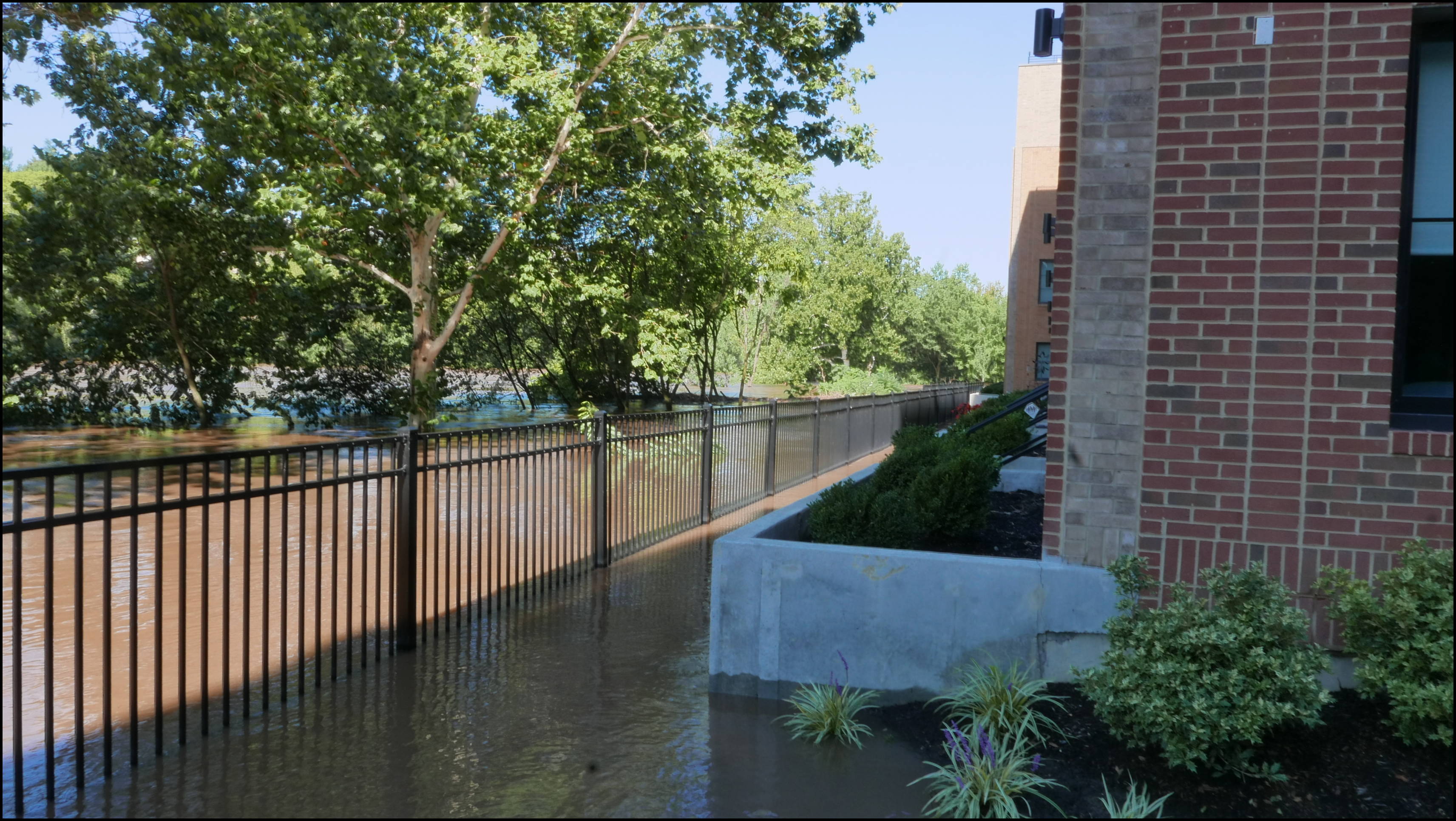 The Locks development -- River behind houses