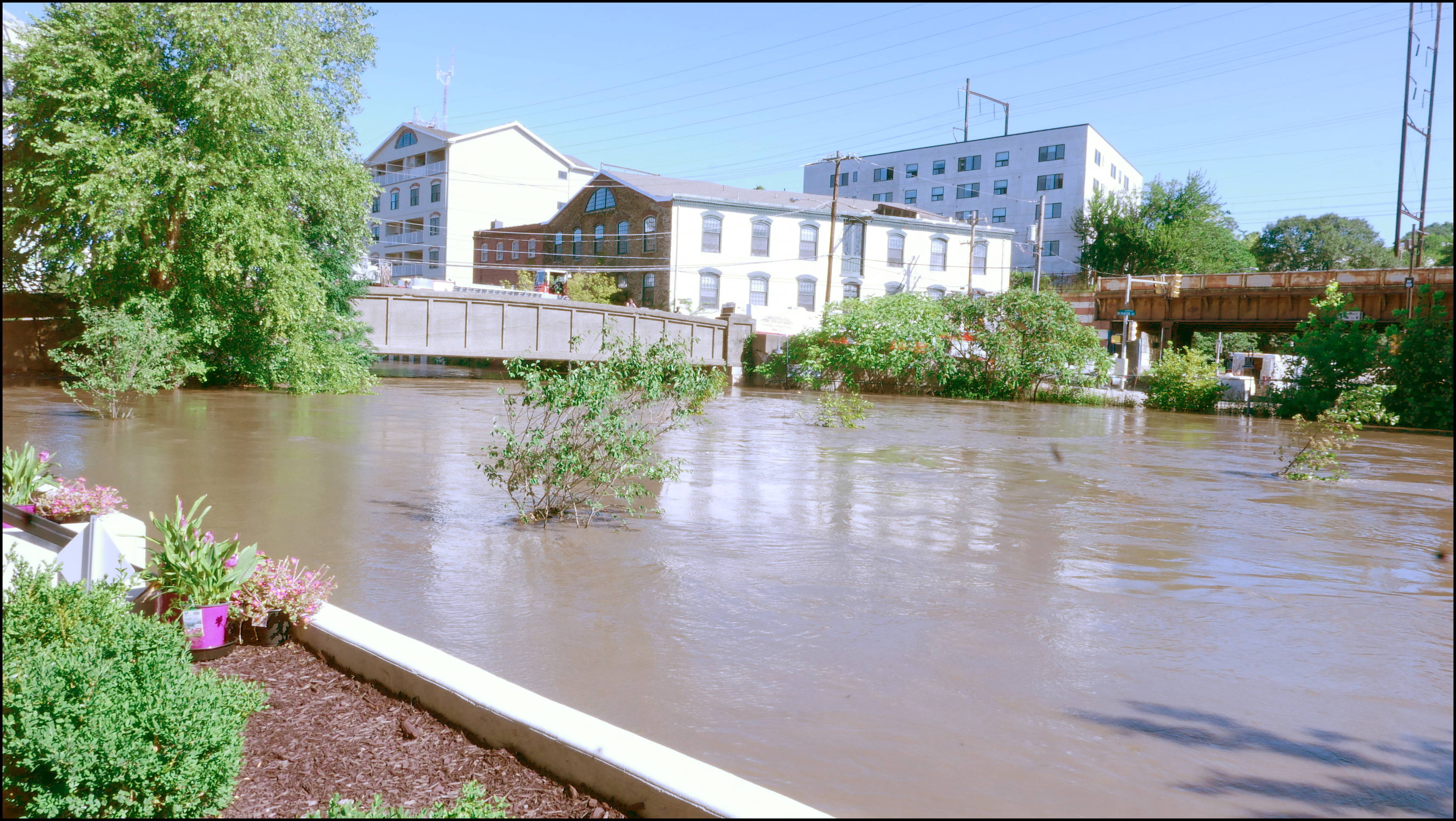 Manayunk Canal behind houses and Watermill development.