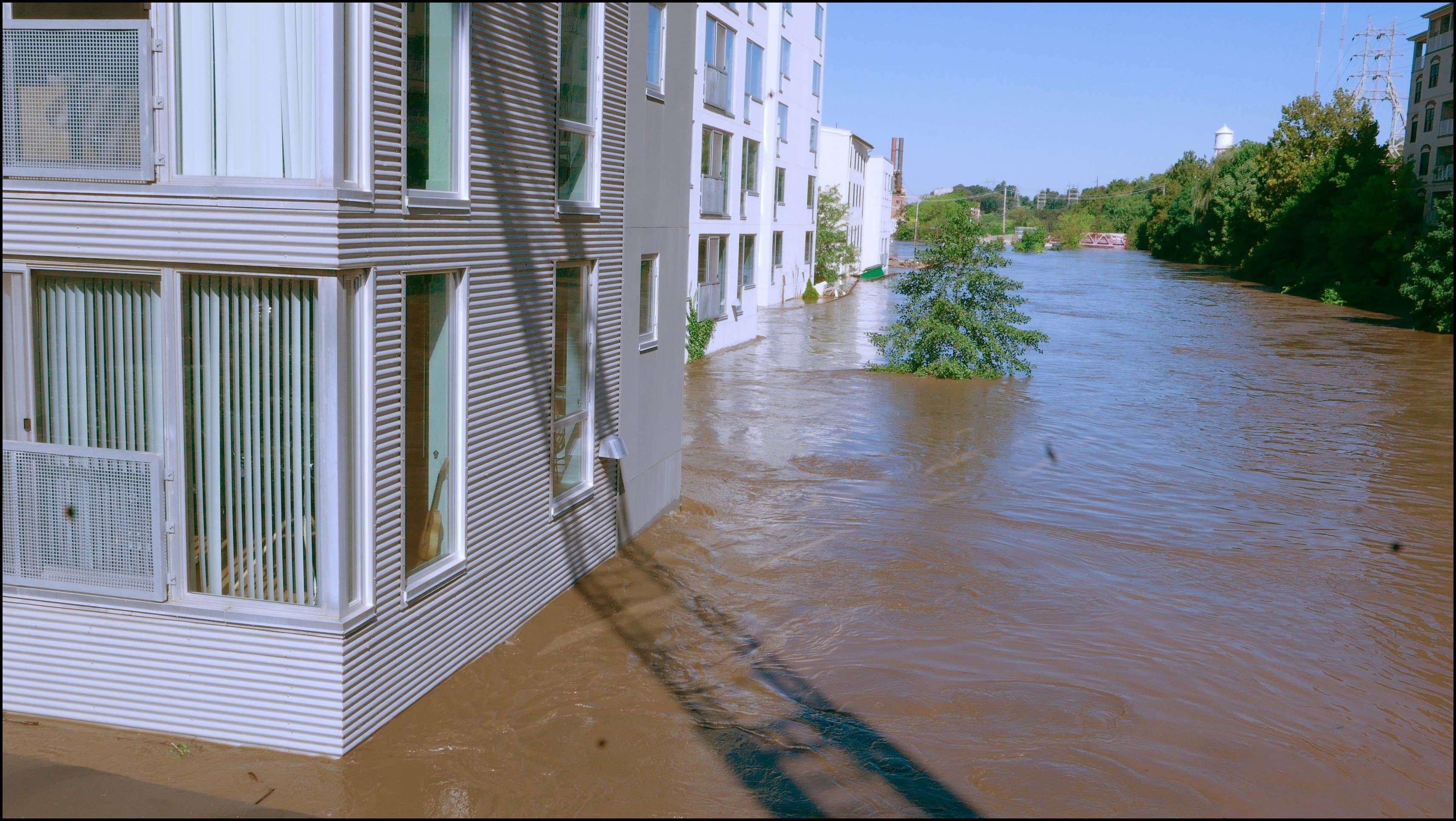 Venice Lofts and the Canal -- There's a parking lot under the building. I usually get pictures of flooded cars but now the garage is completely covered.