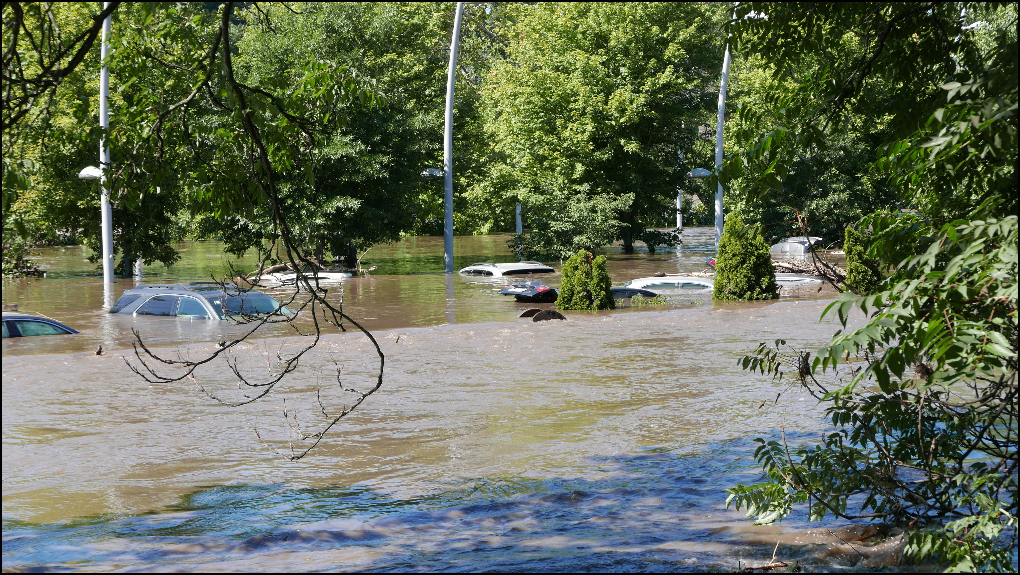 Rector Street and the canal -- VI Rec Center and flooded cars.