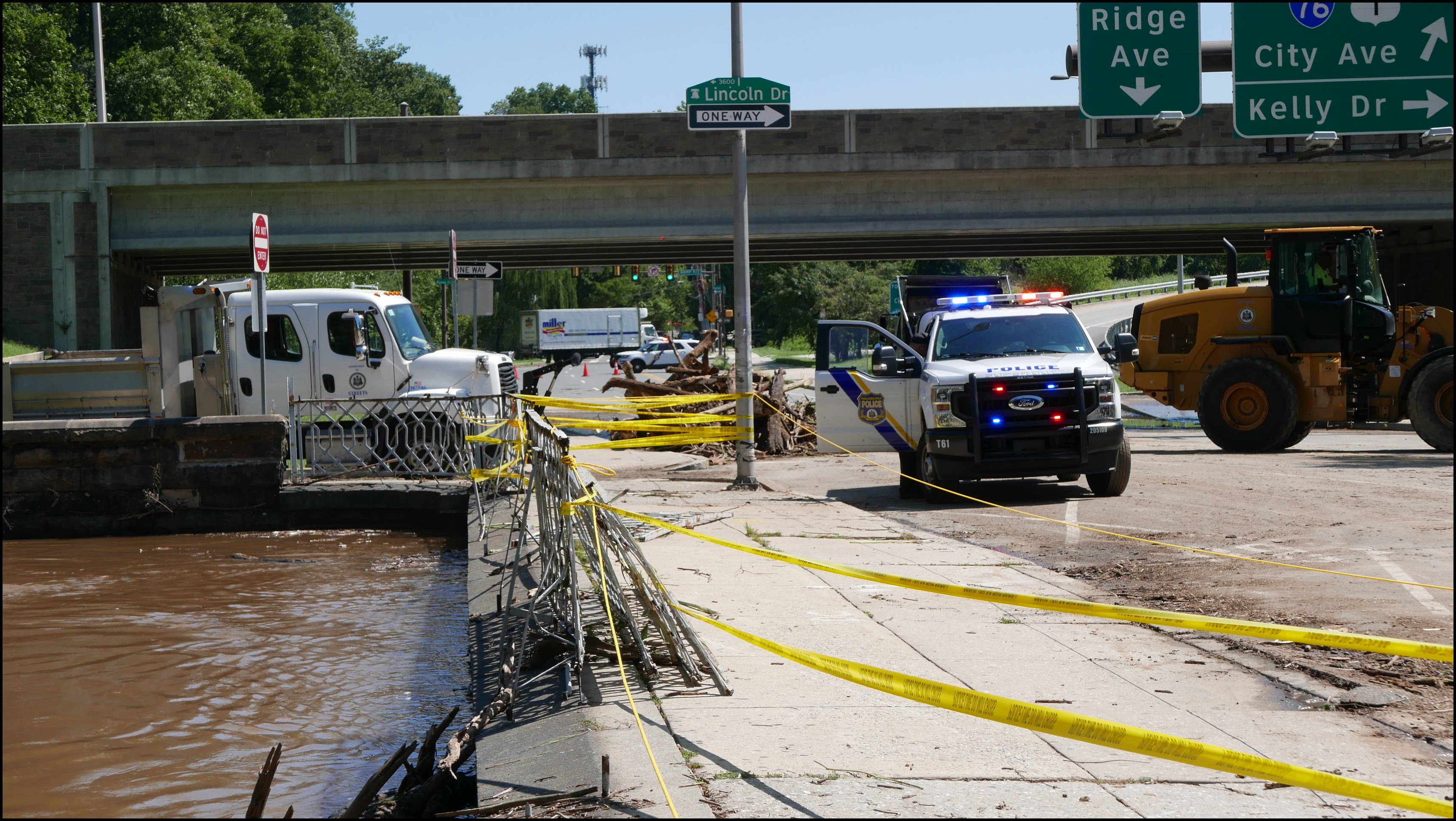 Wissahickon Creek and Ridge Ave (Wissahickon Transfer) -- Debris damaged the railing which is being repaired.