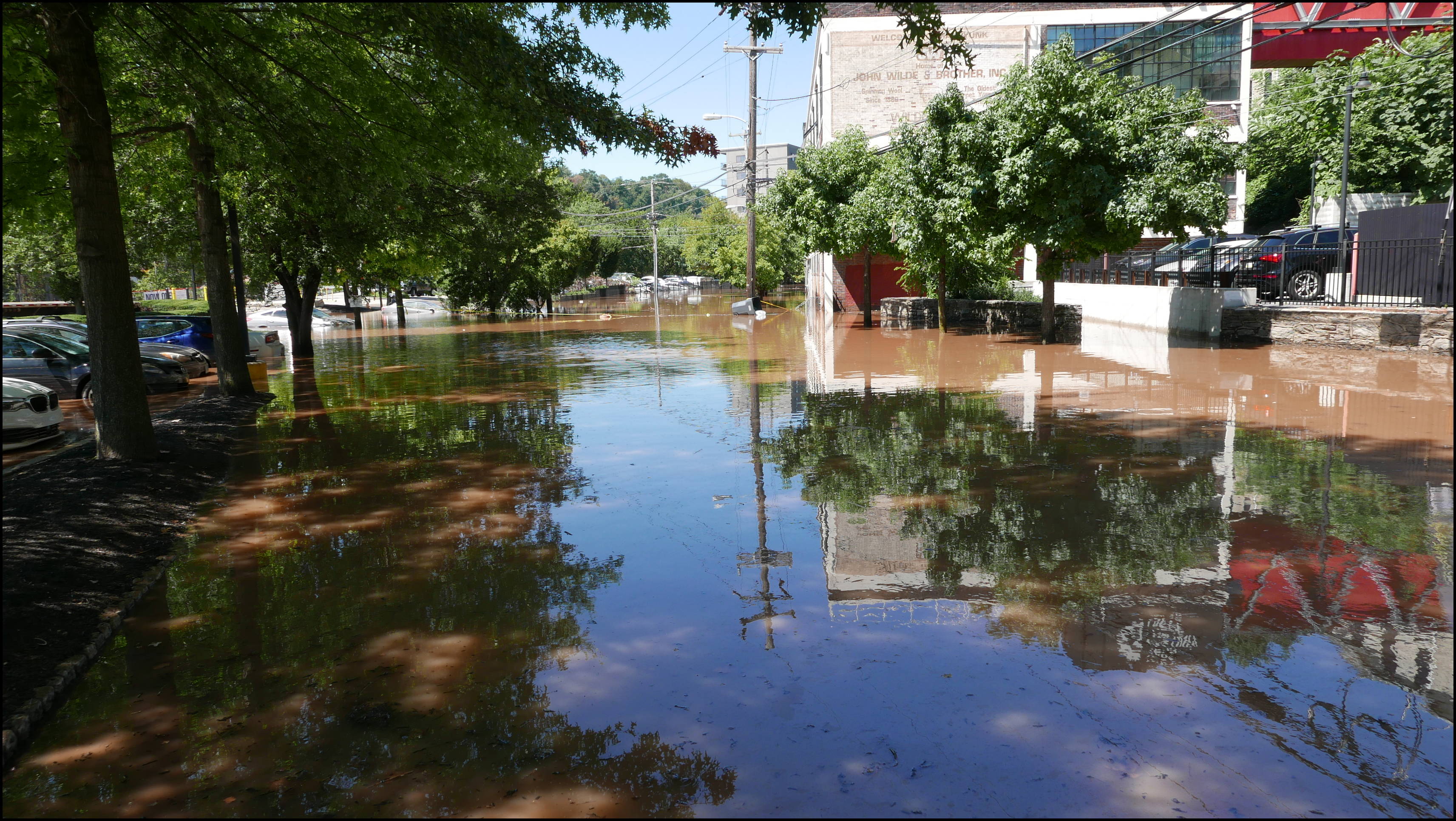 Southern limit of flooding on Main Street -- Flooded cars in the theater parking lot.