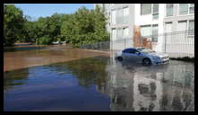Leverington and Flat Rock Road -- Flooded car
