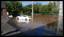 The Locks development -- Flooded car blocking the entrance.