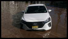 The Locks development -- Flooded car blocking the entrance.