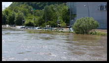 Cotton Street and the canal -- Flooded cars in the Rec Center parking lot