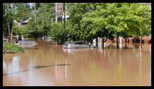 Southern limit of flooding on Main Street -- Flooded cars in the theater parking lot.